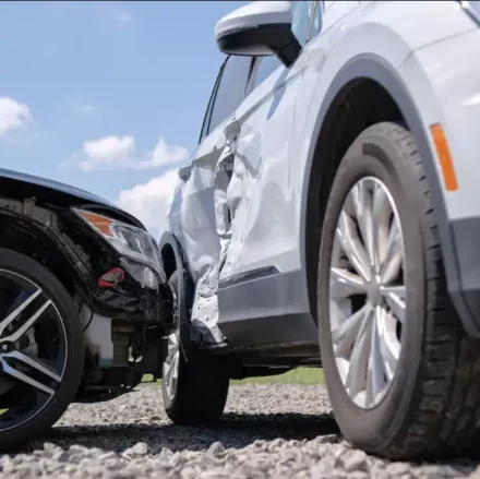 Damaged vehicles after collision in Lewisville, ready to be repaired